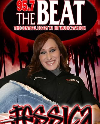 Woman with brown hair smiling, wearing a black shirt, in front of a red and black background with text.