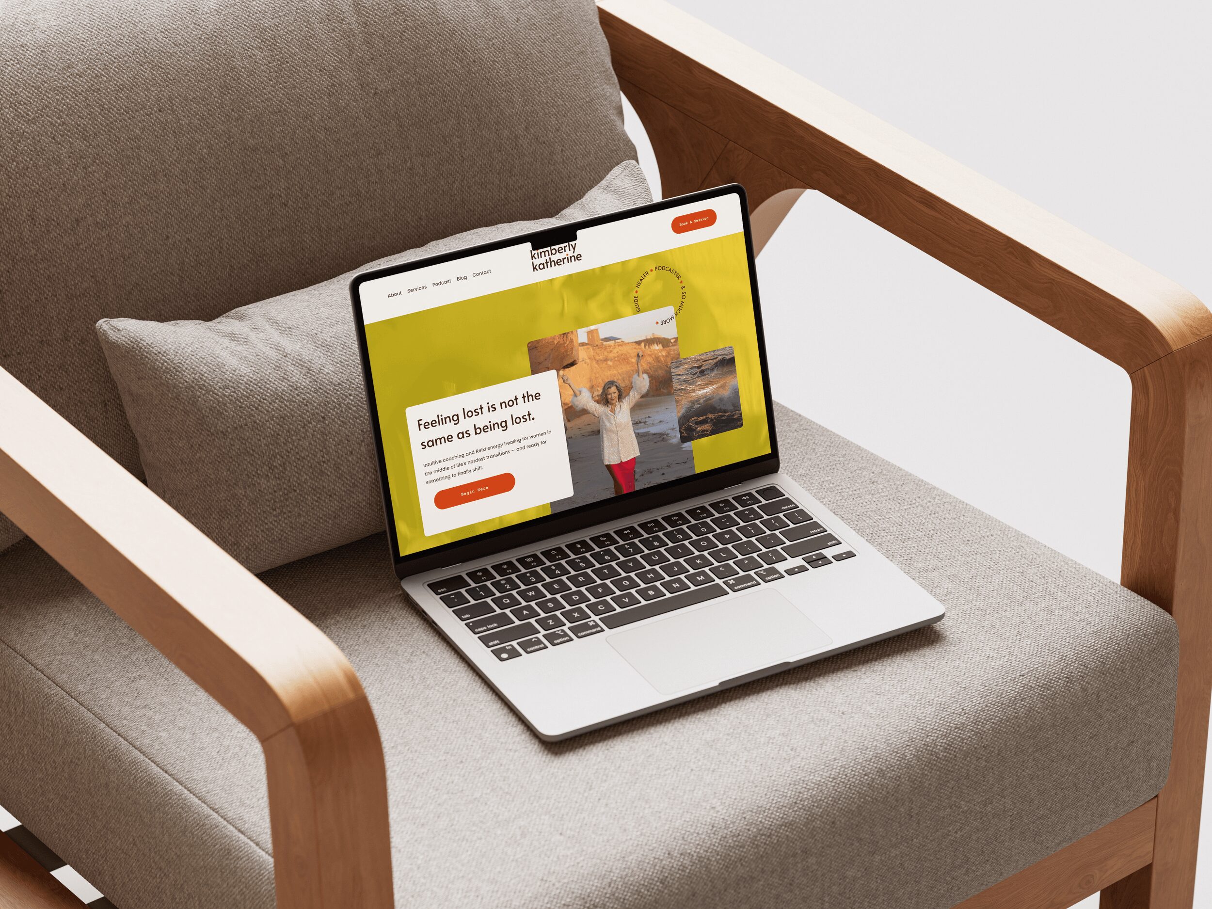 Laptop on a sofa with a cushion, displaying a website with a person holding a dog outside.