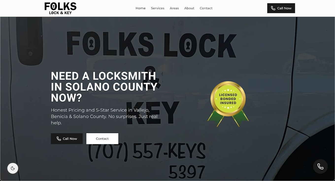 Locksmith advertisement with contact number and a green badge indicating licensed and insured, on a vehicle door.