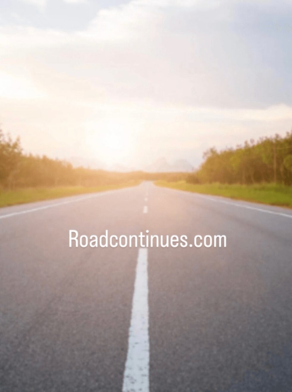 Straight road extending into the horizon with trees on both sides and a partly cloudy sky.