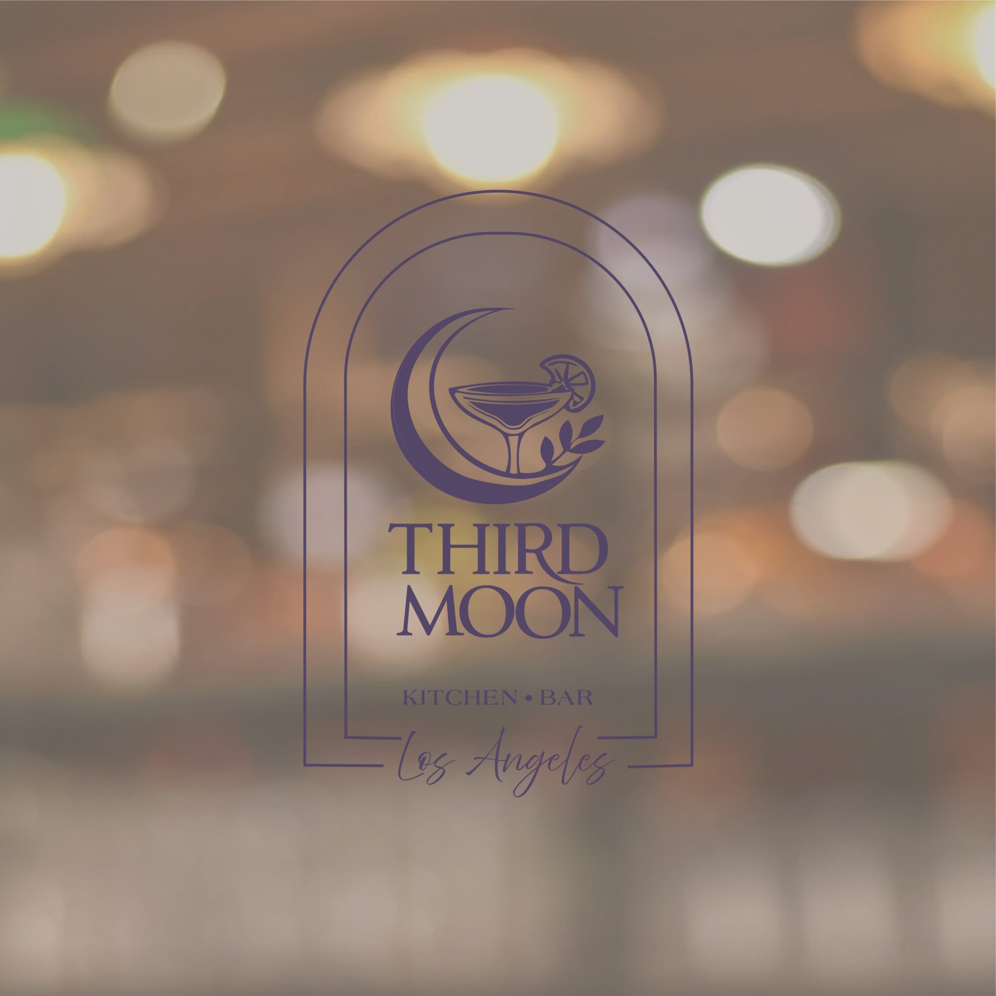 Logo with a crescent moon, cocktail glass, and text for Third Moon Kitchen + Bar in Los Angeles.