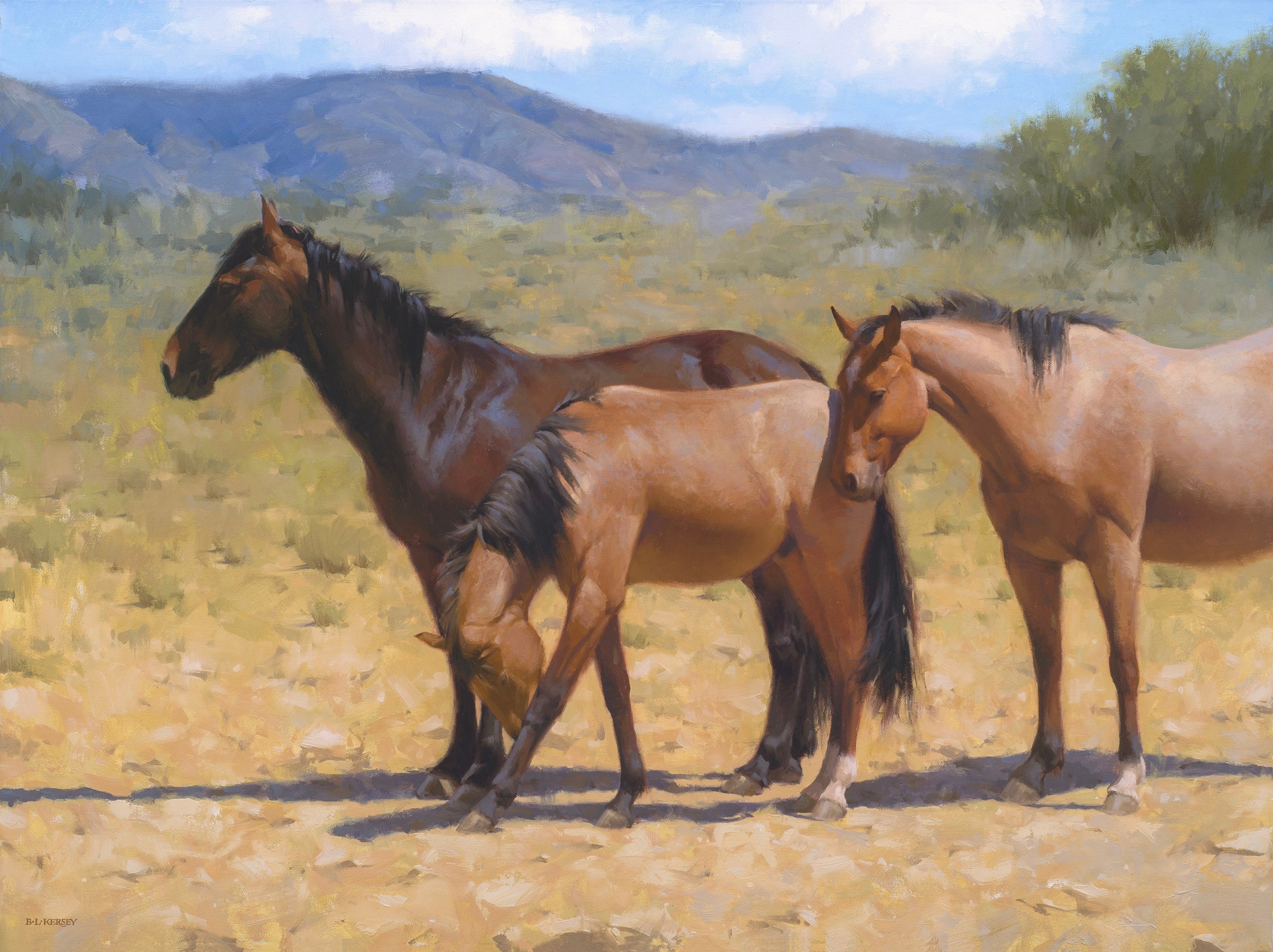 Three horses standing on a dirt path with a landscape of hills and trees in the background.