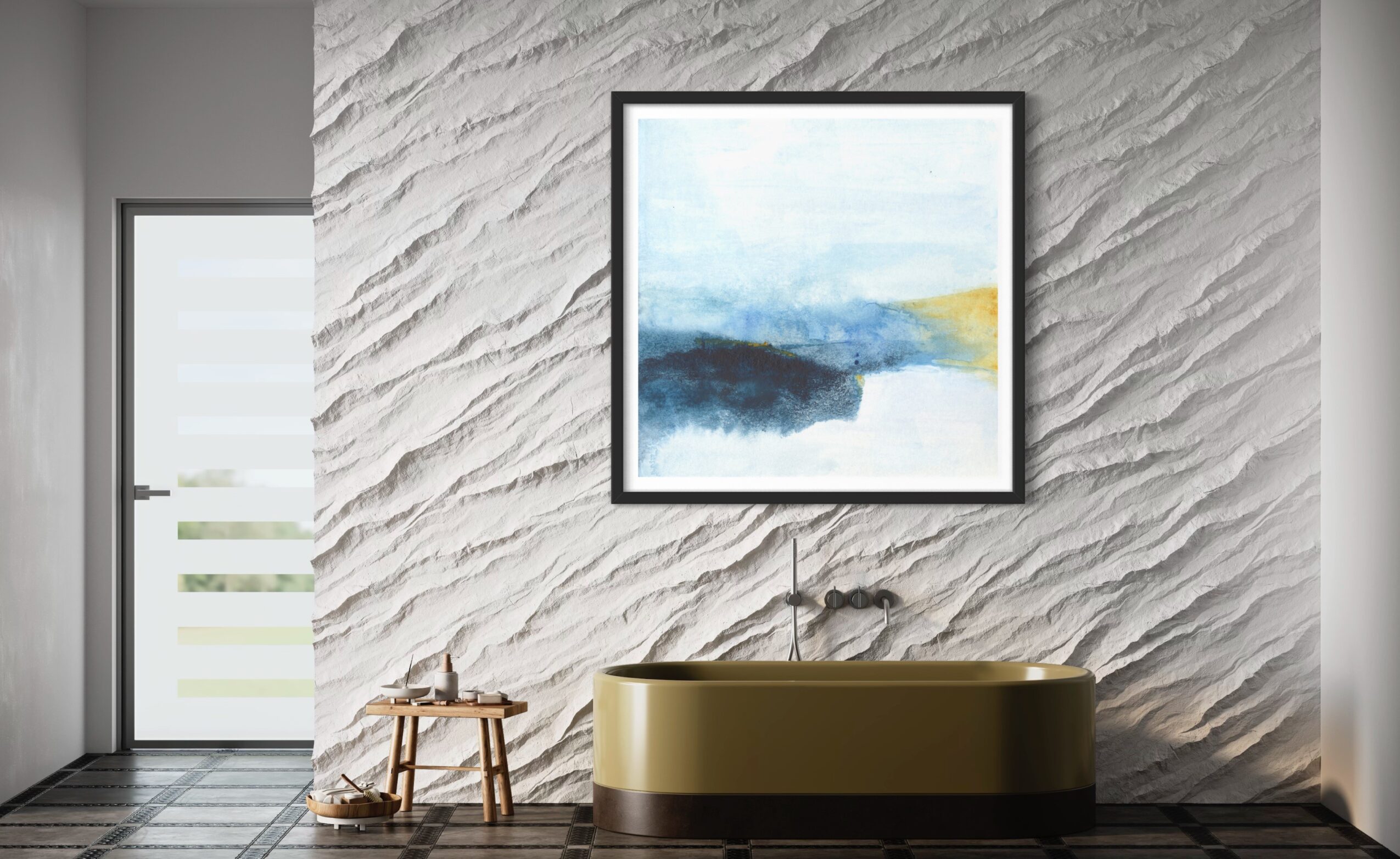 Bathroom with textured wall, framed artwork, bathtub, small stool, and door, in neutral tones.