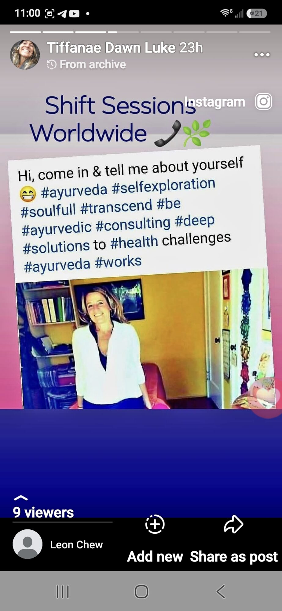Person sitting on a yellow chair in a room with colorful decorations, wearing a white top and dark pants.