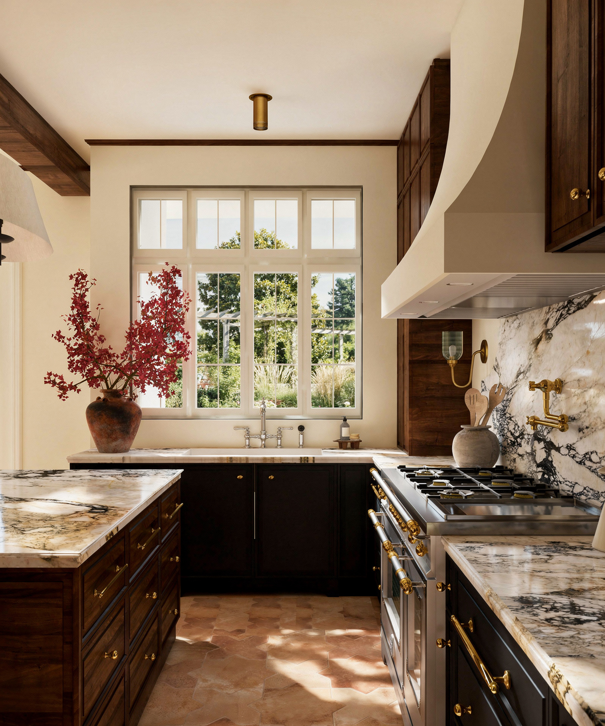 Kitchen with large window, dark cabinets, marble countertops, and a potted plant with red flowers, sunlight streaming in.