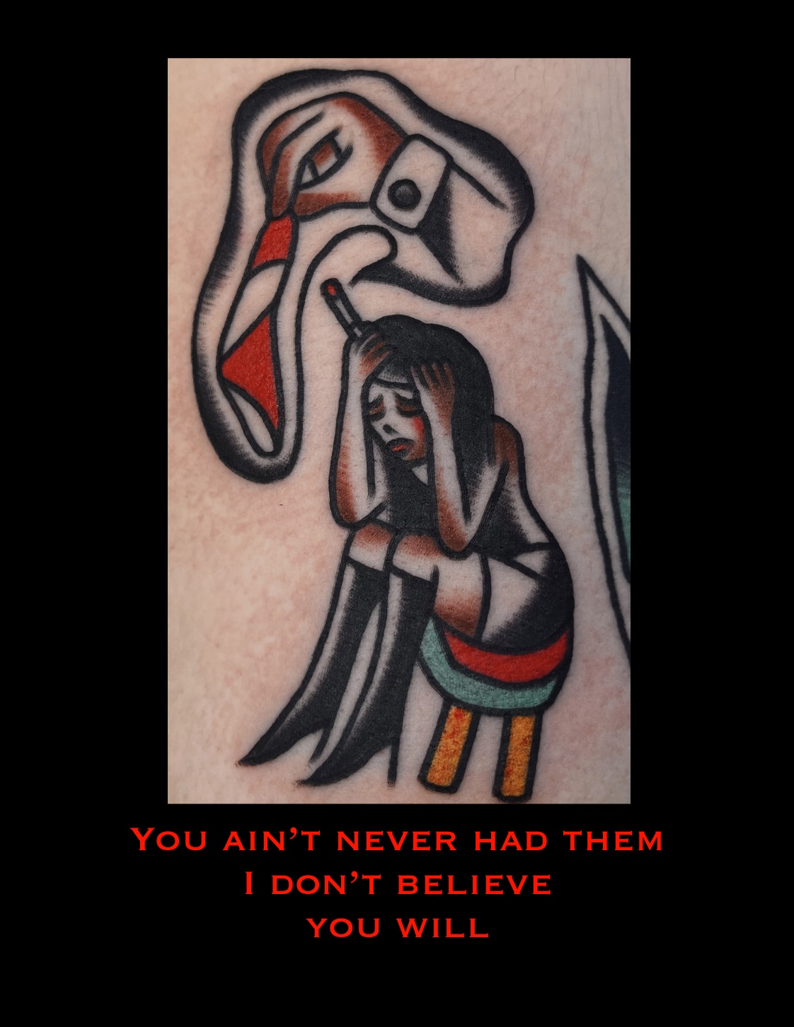 Tattoo of a woman with long hair and a colorful skirt, with a stylized animal head above her, and red text below.