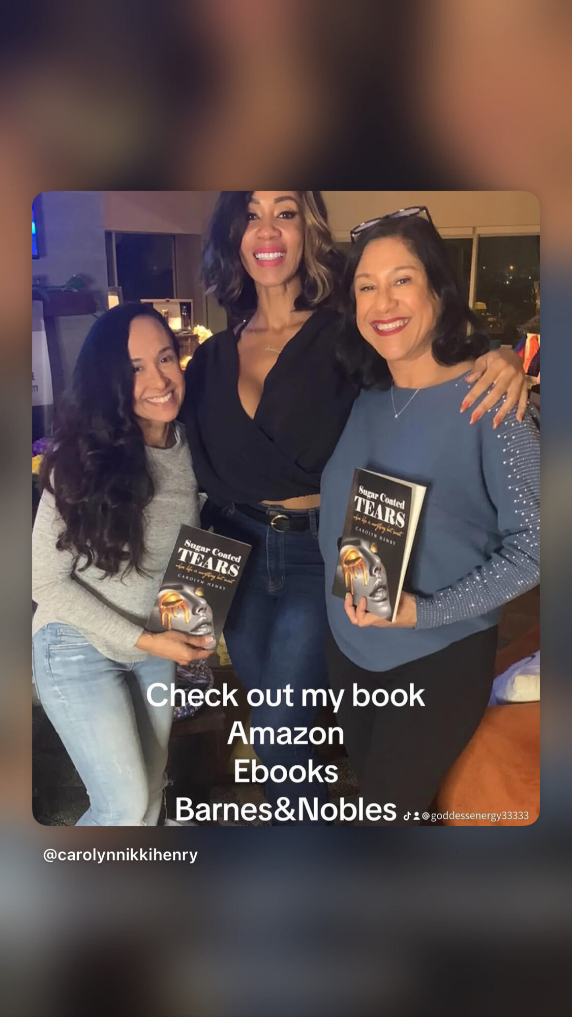 Three women smiling, holding books, standing together indoors. One woman has long dark hair, another has curly hair, and the third has shoulder-length hair. Text promotes books and ebooks. Alt text word count: 27. Confidence: 0.9