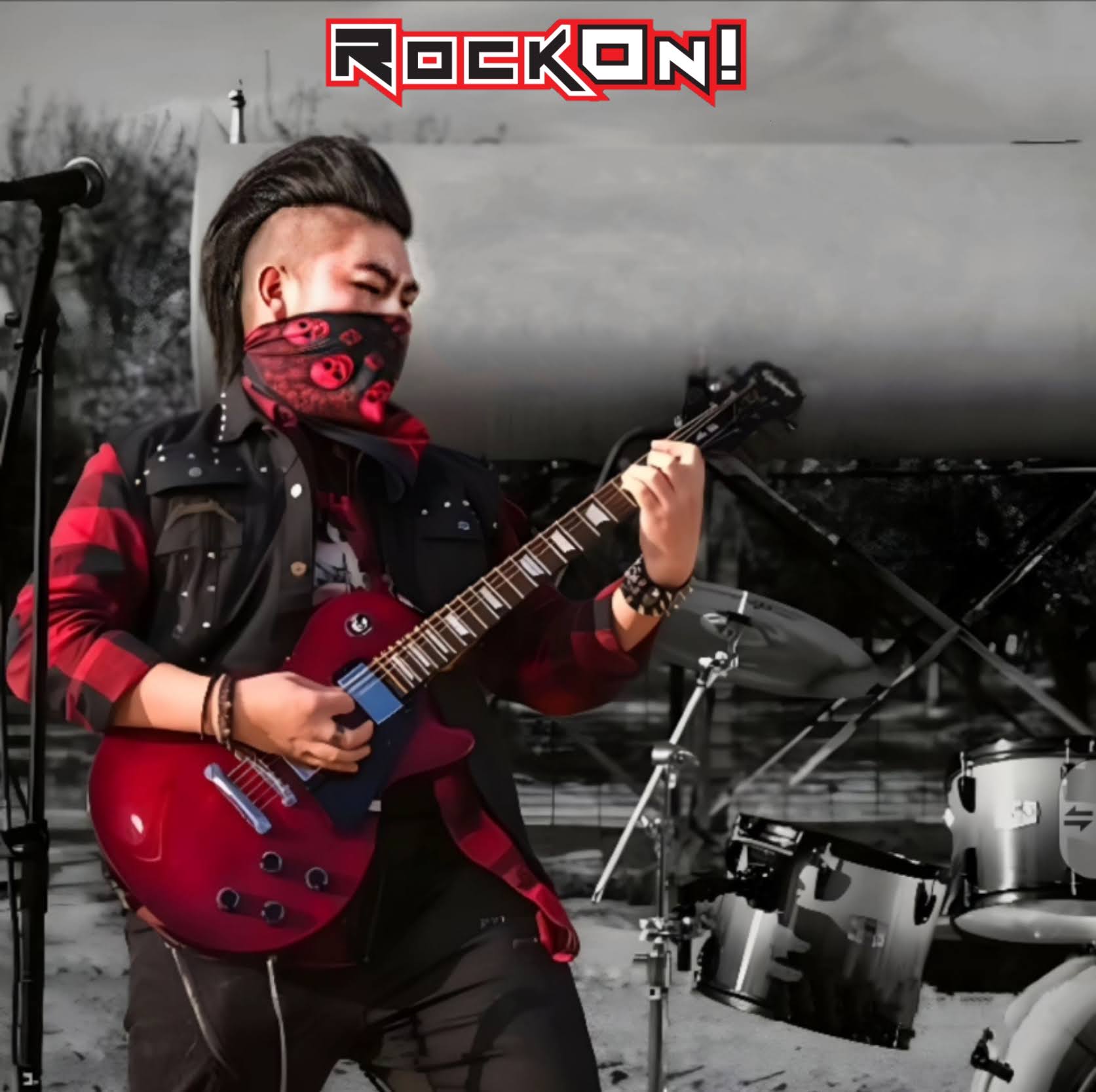 Person playing red electric guitar on stage with drums in background, wearing a black and red outfit and face mask.