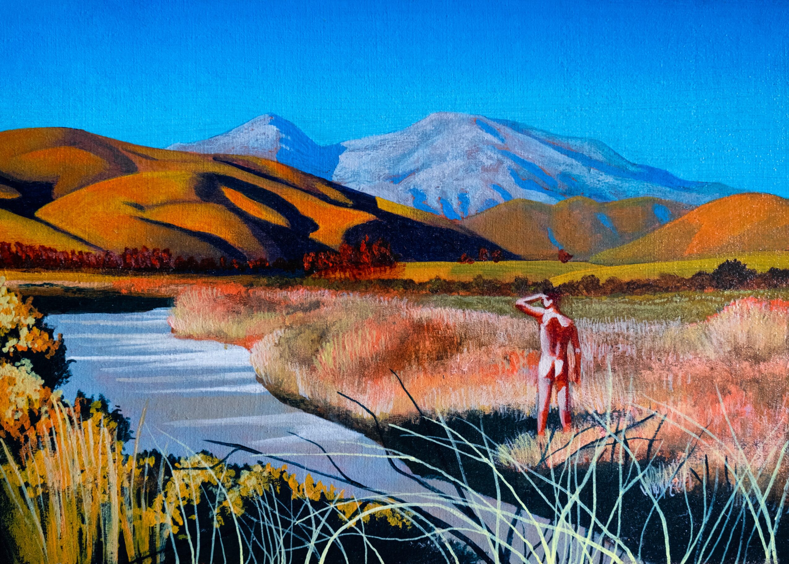 Landscape with mountains, river, and a person standing near the water, colorful fields, and blue sky.