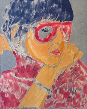 Portrait of a person with short dark hair, wearing red glasses, a red top, and a silver bracelet, resting chin on hand.
